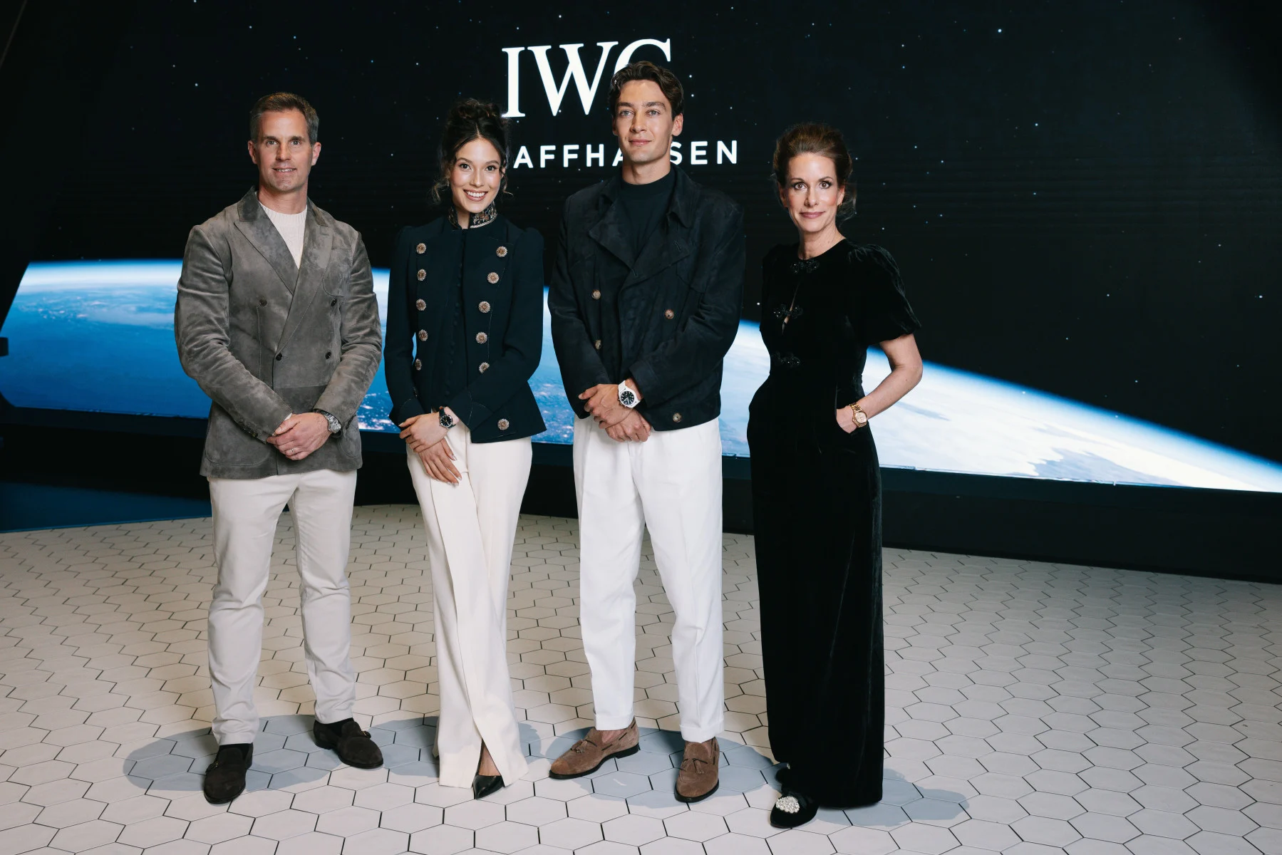 George Russell with IWC executives and fellow ambassador at Watches & Wonders 2026